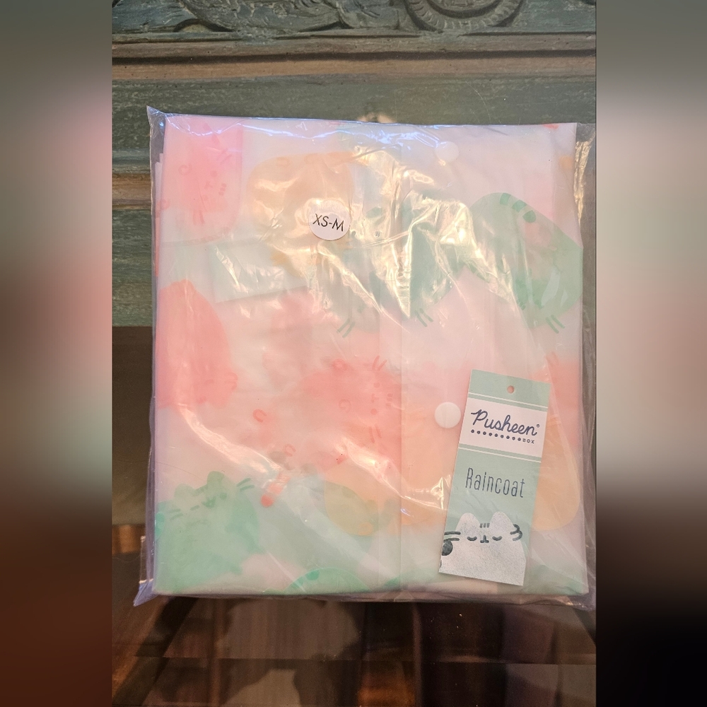 New in bag Pusheen Raincoat size xs-m